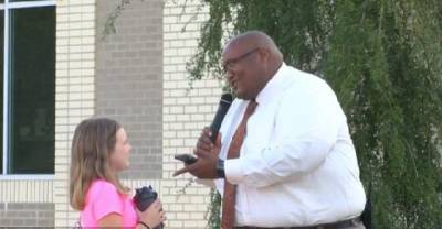 The School Principal Greets Students In The Morning By Dancing And Singing To Them