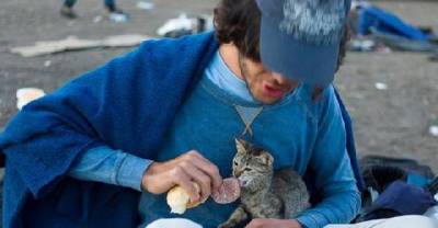 Syrian Refugee Travels Thousands Of Miles With His Kitten To Hungary, Hoping To Start Again