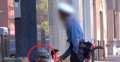 When The Policewoman Beats Him, The Beggar Stays Calm. But What The Kid In The Background Does Makes Him Weep.