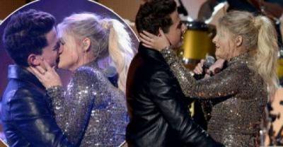 Meghan Trainor & Charlie Puth Lip-Locked On Stage At The American Music Awards