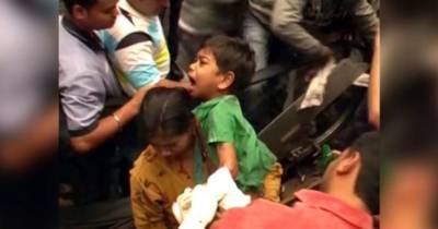7 Year Old Boy's Hand Saved After Getting Trapped In Escalator