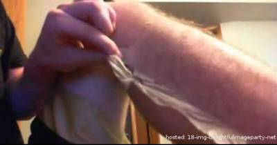 When He Notices Something On His Leg, It Looks Painful. But Notice Something About His Reaction...