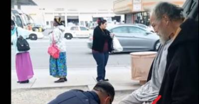 Police Officer Places Homeless Man In Back Of Car, Then He Does THIS