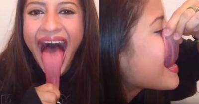 Her Tongue Is How Long?