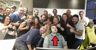 This Guy Fell Asleep At His Desk. His Coworkers Are Jerks