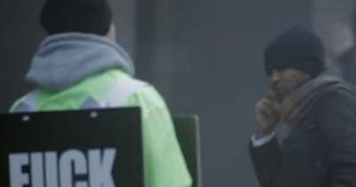 A Man Hangs An Insulting Sign Around His Neck To Make A Point &ndash; And It Works.
