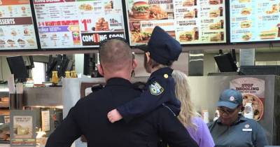 Cop Picks Up 4-Year-Old And Waits In Line To Order. Now Watch When They Turn Around