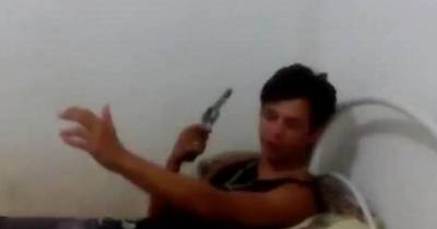 Astonishing Moment Hapless Man Shoots Himself In Head While 'Playing' With Gun - And Survives