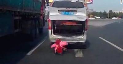 Unbelievable! Toddler Flies Out Of A Car And Goes Unnoticed