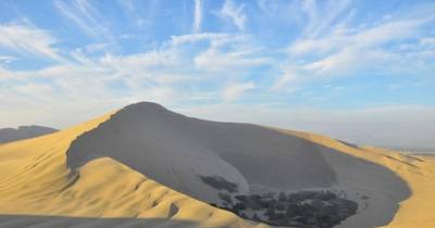 Mystical Oasis Town Flourishes In The Middle Of The Harshest Environment On Earth.