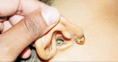 This Is The Gross Earbud Habit We're All Guilty Of