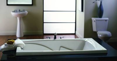 Things That Happen When You Don't Clean Your Shower Or Tub Enough
