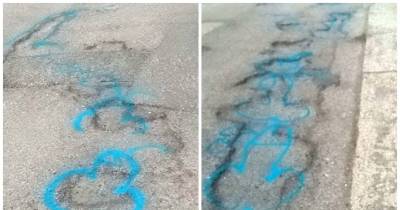 Grafitti Artist's Explicit Solution To Britain's Pothole Problem Is Becoming Contagious