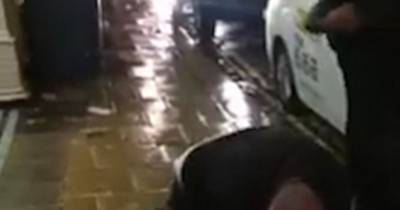 Bouncers Slam A Bleeding Man's Head Onto Pavement Outside A City Centre McDonald's As He Screams Out In Pain In Shocking Video