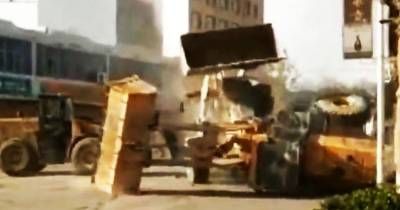 Chinese Firms Battle It Out With Bulldozers In The Streets