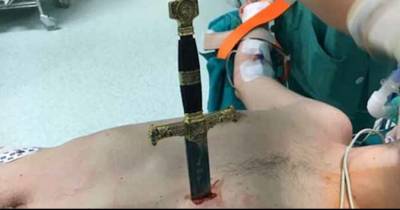 Dude Has A Sword Pulled From His Chest While His Heart Beats Right Beside It
