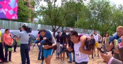 Bizarre 'Wife Carrying Contest' Sends Serious Message To Married Couples