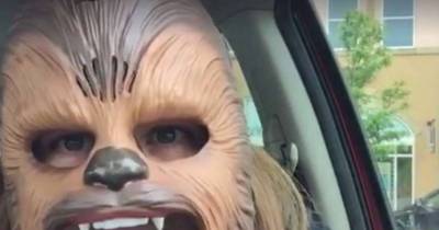 This Woman Found The Key To Happiness And It's A Talking Chewbacca Mask