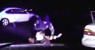 'Help! He's Trying To Get My Gun!' Chilling Footage Shows Police Officer Fighting For His Life After He Was Brutally Attacked By Wanted Criminal In An Arrest Gone Horribly Wrong