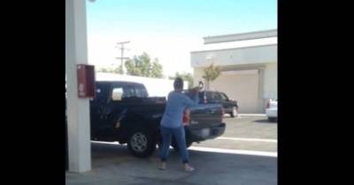 Pissed Off Woman Gives Truck Driver 10 Seconds To Move His Car, Starts Whacking Car With Pipe When He Doesn&rsquo;t