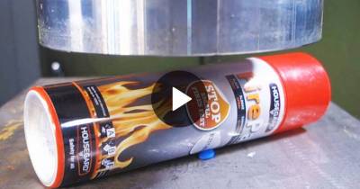 Crushing A Fire Extinguisher With A Hydraulic Press