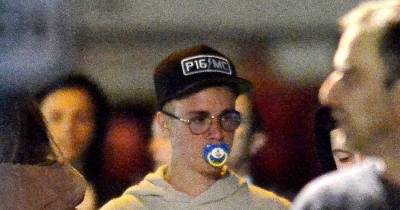 Baby! Justin Bieber Pictured Sucking On A Dummy Following Night Out With Rita Ora