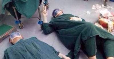 After 32 Hours In The Operating Room, These Surgeons Break Down On The Floor.
