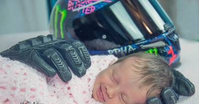 Heartbreaking Picture Of Newborn Baby Cradled By Her Late Father's Motorcycle Gloves