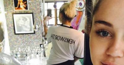 Miley Cyrus Pretty Much Confirms Liam Hemsworth Romance Dressed In T-Shirt Emblazoned With His Name