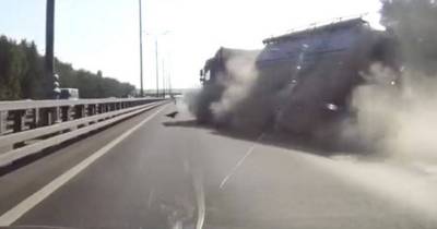 Fuel Tanker Crashes Through Motorway Safety Barrier Into Oncoming Traffic After Tires Explode In Terrifying Dashcam Footage