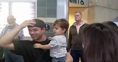 Dad Got Off Of Plane To See His Wife And 2 Kids, But Then He Reads Their Shirts.