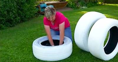 She Drags Three Old Tires Into Her Yard And Flips Them Over. When She&rsquo;s Done? It's Stunning
