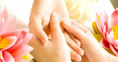 Woman Demonstrates Jin Shin Jyutsu Hand Reflexology For Emotional Relief