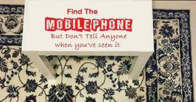 People Can't Find The Mobile Phone On This Rug And It's Really Stressing Them Out
