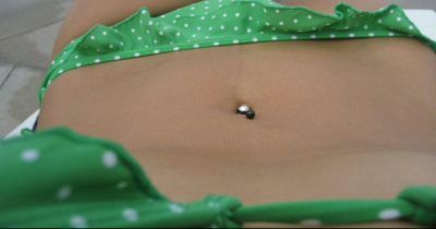 A 16-Year-Old Takes Off Her T-Shirt At The Beach. But The Person By Her Side Sees Something That Nobody Else Does