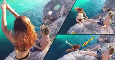 Guy Refuses To Help Girlfriend And Lets Her Fall Off Cliff