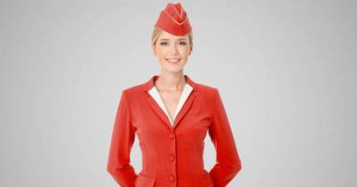 This Is Why The Cabin Crew Keep Their Arms Behind Their Backs When Greeting Passengers
