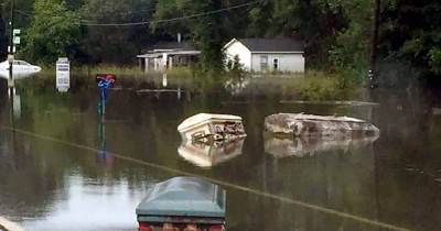 Coffins Float Down The Streets In Deadly Louisiana Floods