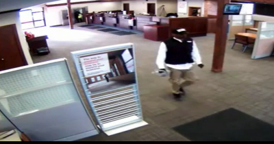 Bank Robber Stops To Pose For The Camera