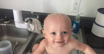 All Smiles! Cops Rescue A Baby Covered In Vomit From His 'Drunk' Mother