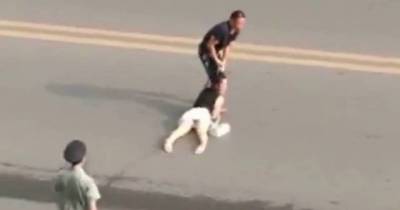 Horrifying Footage Of Woman Screaming For Help Being Dragged Across Street By Her Hair As Officer Just Watches