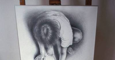 This 'Art' Looks Like a Mess. Until You Put a Mirror Next to it