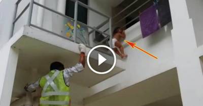 Man Saves This Baby Hanging From The Ledge