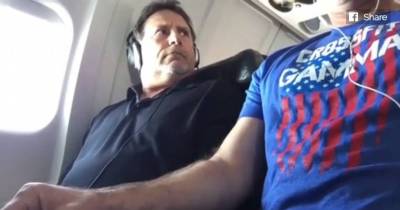 Rude Passenger Hogs The Arm Rest, Then Man In The Middle Seat Teaches Him A Lesson