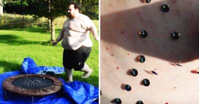 Fat Guy Belly Flops Onto Bed Of Thumb Tacks