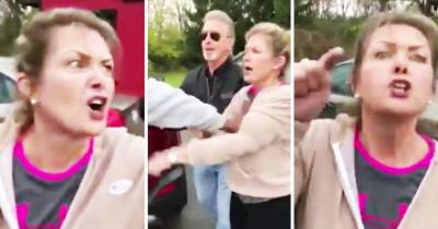 Racist Lady Freaks Out On Black Lady After Voting In Michigan.