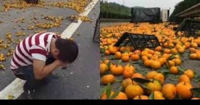 Driver Breaks Down In Tears After Villagers Loot His Spilled Oranges On A Highway
