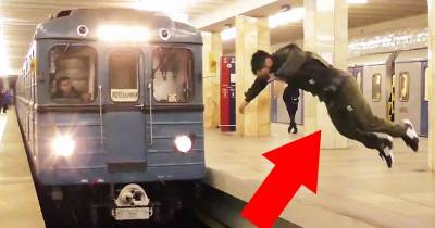 Man Does Insane Front-Flip In Moscow Subway.