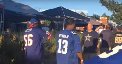 Cowboys Fan Gets Punched So Hard By Giants Tailgater His Pants Fall Down