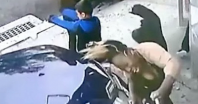 Woman Jumps Infront Of Car In Order To Save Child